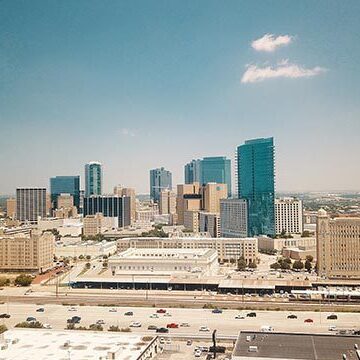 Fort Worth cityscape with clear blue sky.